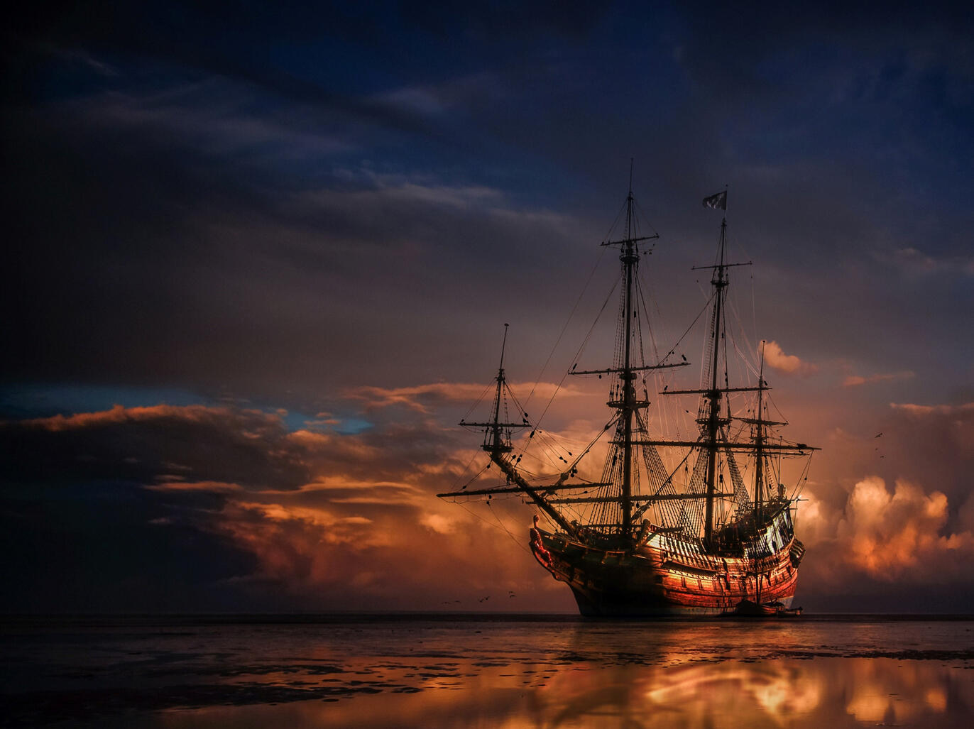 pirate ship at sunset